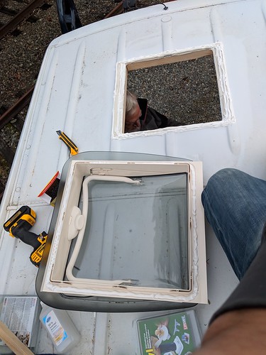 Caulking the crap out of the skylight before installing it